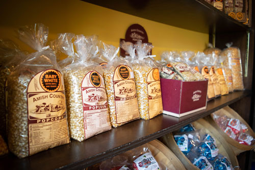 Amish Country popcorn kernels on shelf.